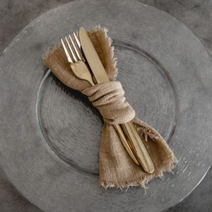 Musselinservietten in Ockergelb